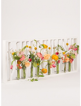 Flowers support with painted branches and test tubes